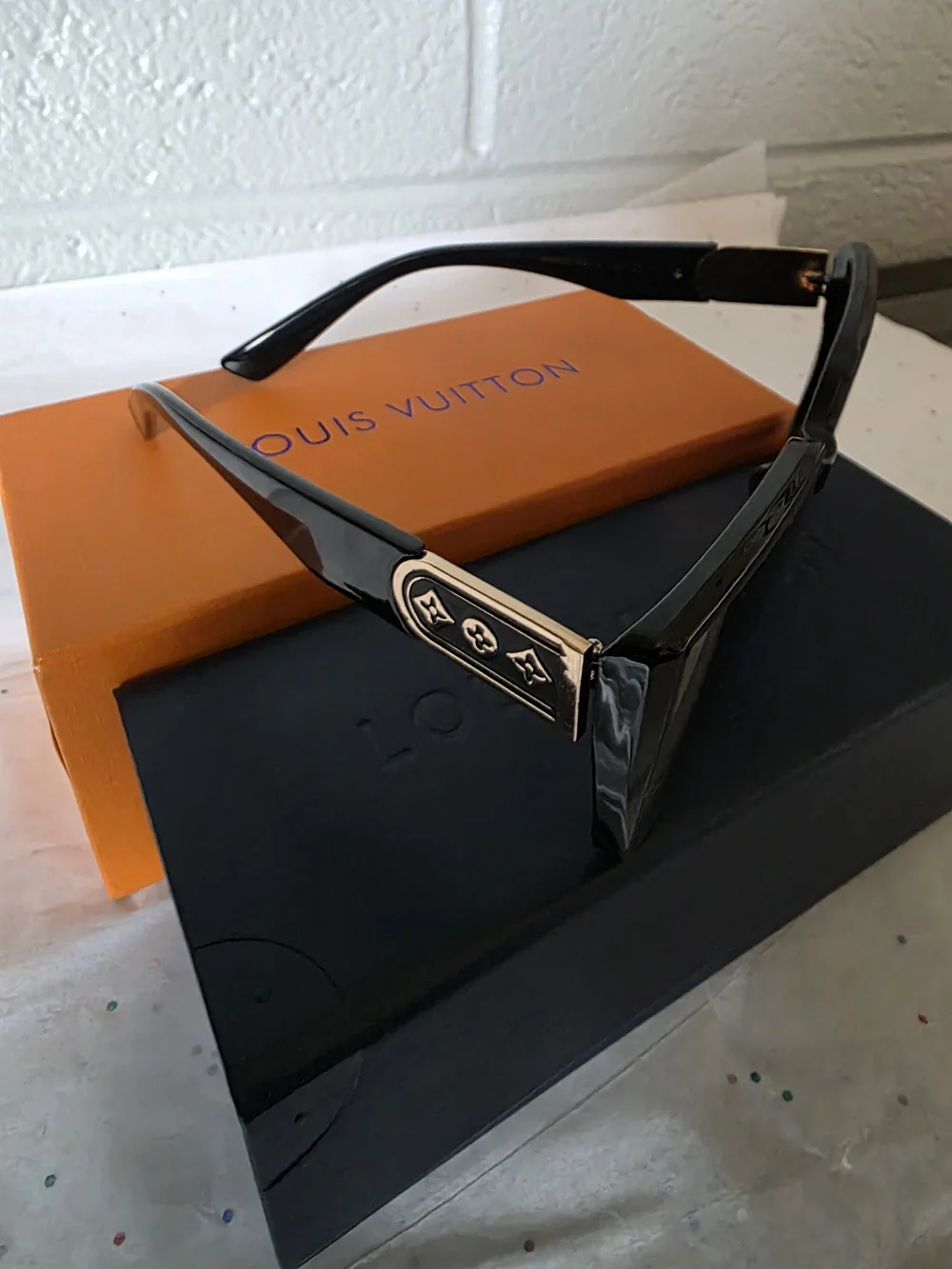Black Sunglasses with Red-Tint Lenses